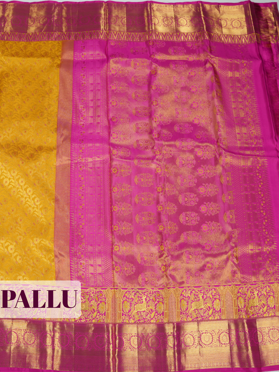 Yellow Kanchipuram Saree with Peacock and Temple-Arch Zari Border