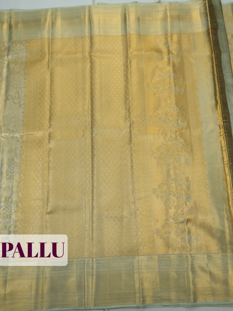 Pista Green Pure Tissue Silk Saree with Chevron Zari Weave