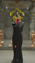 Black Fancy Georgette Saree with An embellished sequin and ruffle border