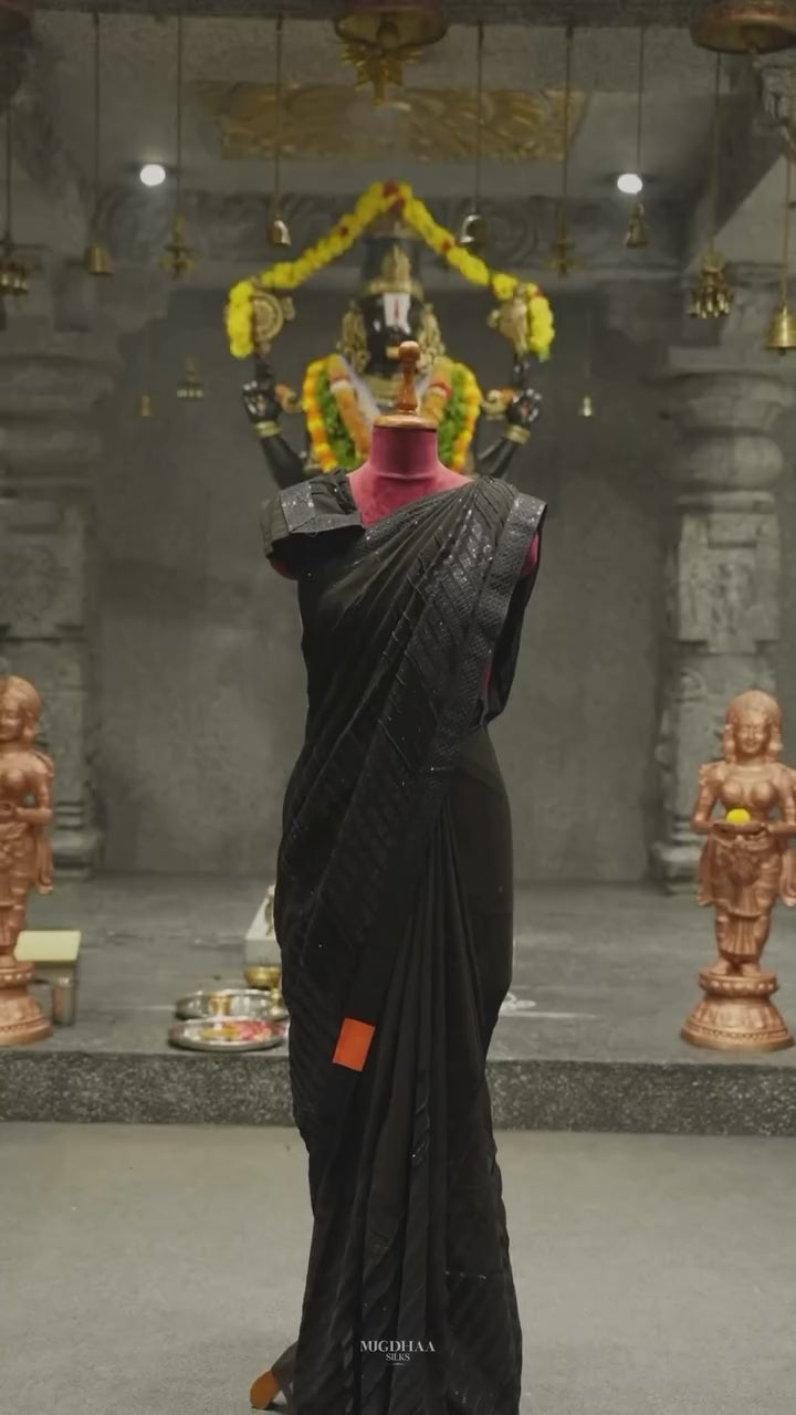 Black Fancy Georgette Saree with An embellished sequin and ruffle border