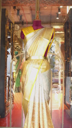Champagne Gold Pure Kanjivaram Tissue Silk Saree with An elephant-and-floral brocade border